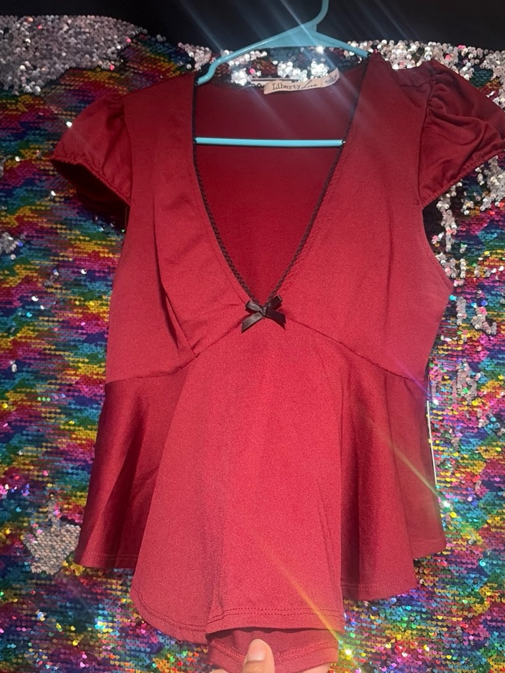 NWT Burgundy Peplum Top with Bow Accent